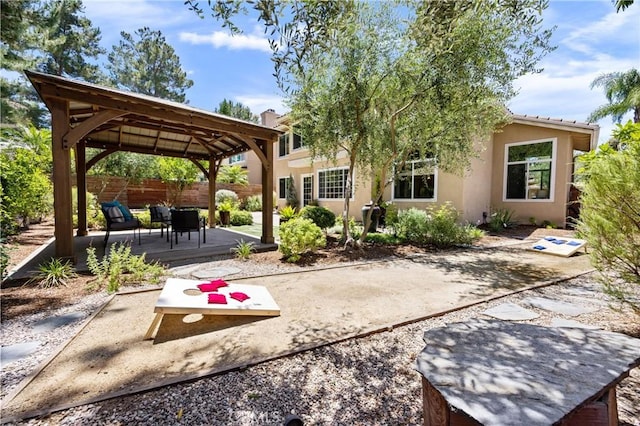 18 Via Tigra, Rancho Santa Margarita, CA 92688 - back of house featuring a gazebo, stucco siding, and a patio area