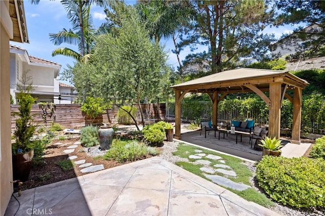 18 Via Tigra, Rancho Santa Margarita, CA 92688 - fenced backyard with a gazebo, an outdoor living space, and a patio area