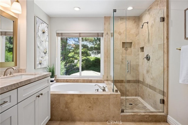 18 Via Tigra, Rancho Santa Margarita, CA 92688 - full bath featuring a garden tub, vanity, and a stall shower