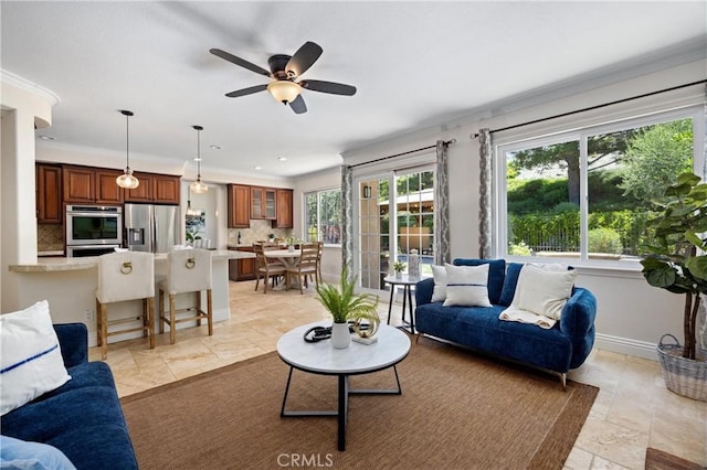 18 Via Tigra, Rancho Santa Margarita, CA 92688 - living room featuring ornamental molding and a ceiling fan