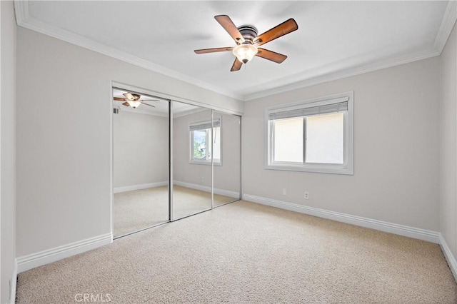 18 Via Tigra, Rancho Santa Margarita, CA 92688 - unfurnished bedroom with carpet floors, ornamental molding, a closet, and a ceiling fan