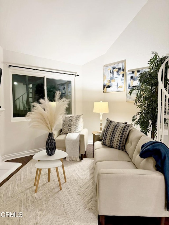 501 E Del Mar Blvd Unit 303, Pasadena, CA 91101 - living room with lofted ceiling and wood finished floors