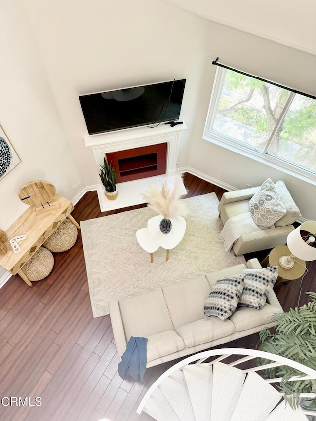 501 E Del Mar Blvd Unit 303, Pasadena, CA 91101 - living room with baseboards and dark wood-style floors
