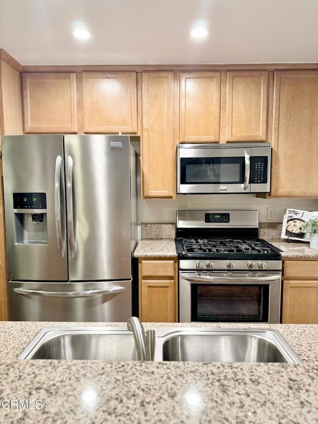 501 E Del Mar Blvd Unit 303, Pasadena, CA 91101 - kitchen with stainless steel appliances, light brown cabinetry, light stone countertops, and recessed lighting
