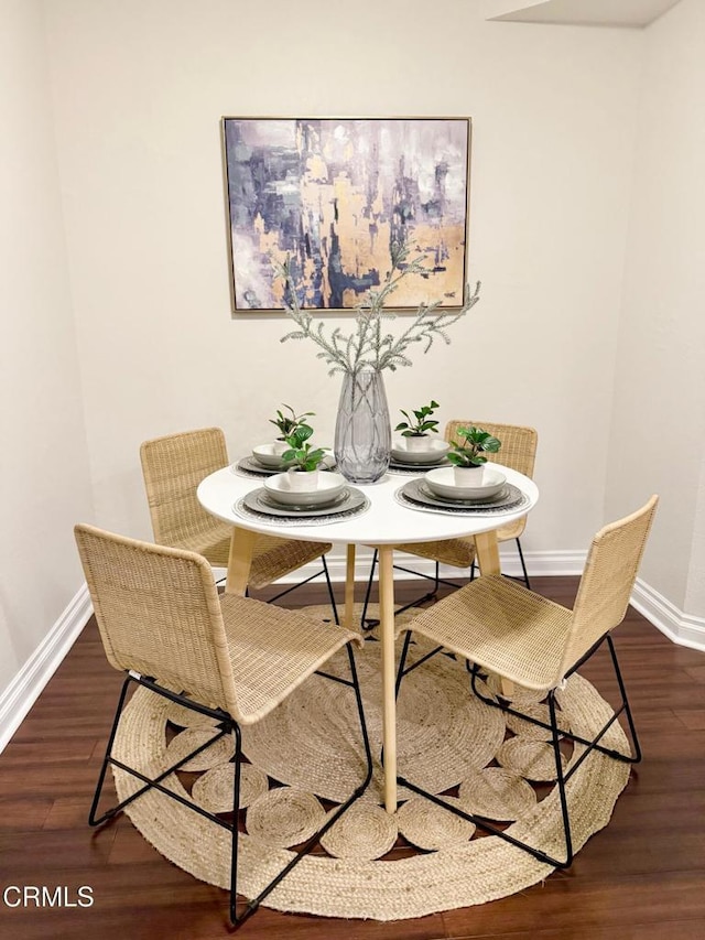 501 E Del Mar Blvd Unit 303, Pasadena, CA 91101 - dining area with baseboards and wood finished floors