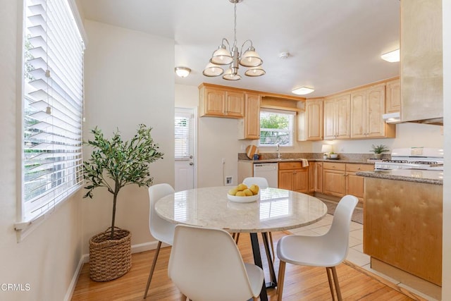 1500 E Topeka St, Pasadena, CA 91104 - kitchen with light brown cabinets, white appliances, light wood-type flooring, a chandelier, and light stone countertops