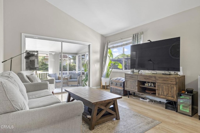 1716 Shoreline St, Camarillo, CA 93010 - living room with vaulted ceiling, healthy amount of natural light, and wood finished floors