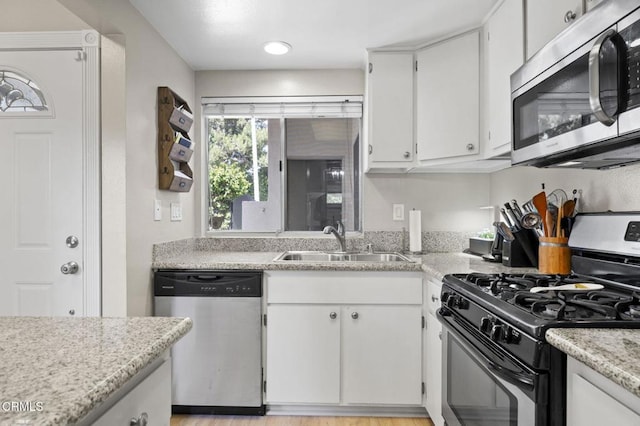 1716 Shoreline St, Camarillo, CA 93010 - kitchen featuring appliances with stainless steel finishes, light countertops, and white cabinets