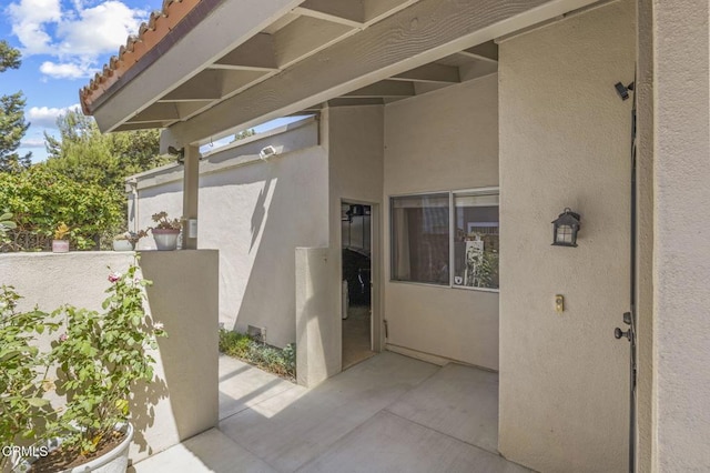 1716 Shoreline St, Camarillo, CA 93010 - doorway to property with stucco siding and a patio