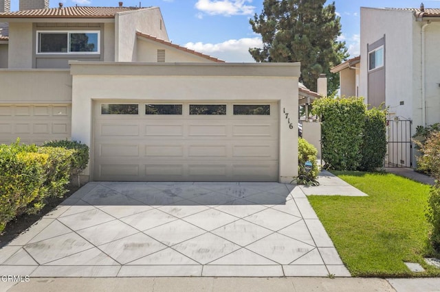 1716 Shoreline St, Camarillo, CA 93010 - view of front of property with stucco siding, concrete driveway, a tiled roof, and a garage