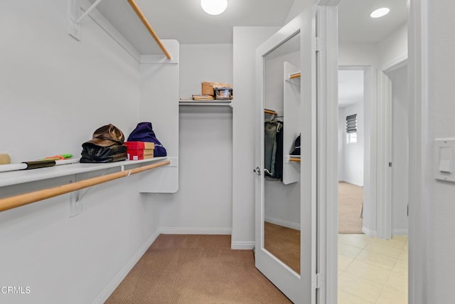 665 Tiber River Way, Oxnard, CA 93036 - walk in closet featuring light carpet