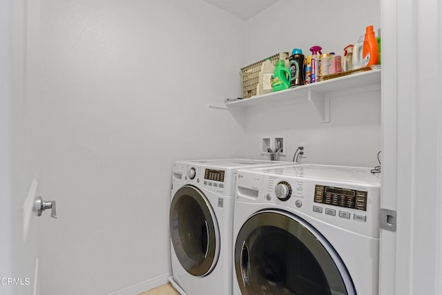 665 Tiber River Way, Oxnard, CA 93036 - laundry area with washer and clothes dryer