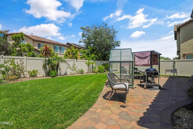 665 Tiber River Way, Oxnard, CA 93036 - fenced backyard featuring a patio and an exterior structure