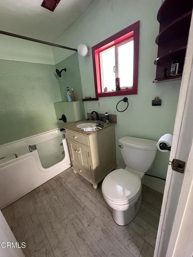 752 Stewart St Unit 1/2, Fort Bragg, CA 95437 - bathroom featuring shower / bath combination, vanity, and wood finished floors