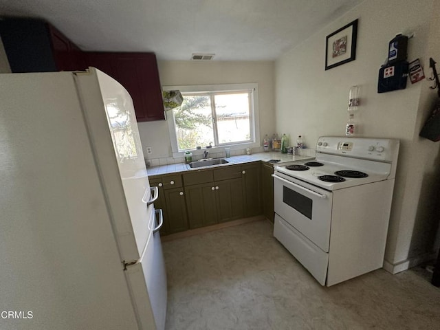752 Stewart St Unit 1/2, Fort Bragg, CA 95437 - kitchen with white appliances, light countertops, and light colored carpet