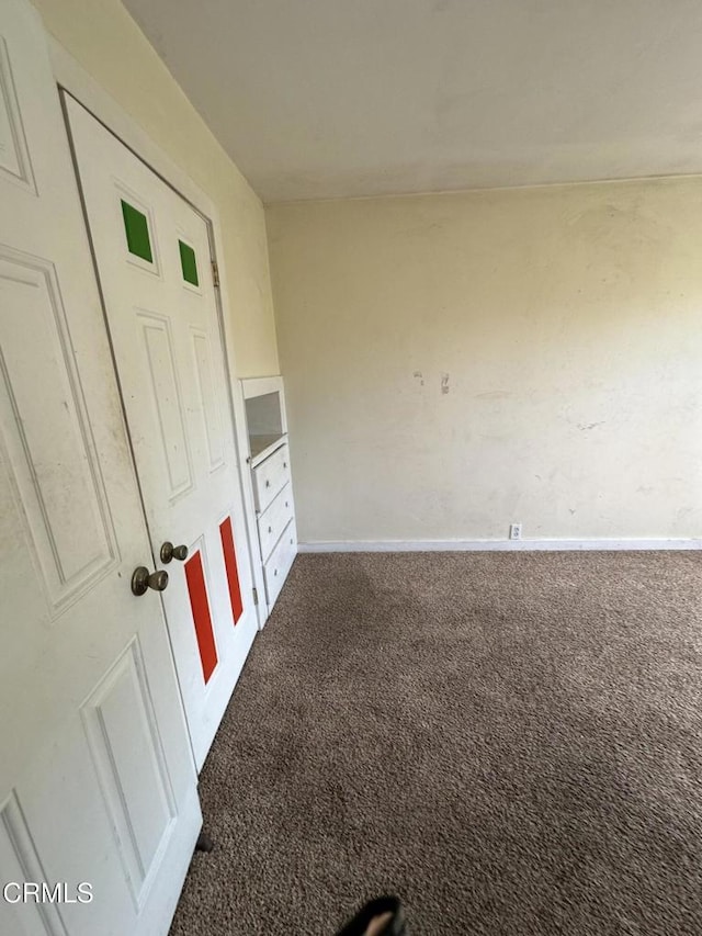 752 Stewart St Unit 1/2, Fort Bragg, CA 95437 - unfurnished bedroom with carpet flooring and baseboards