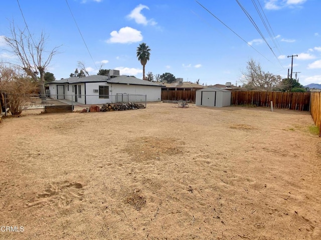 816 W Alene Ave, Ridgecrest, CA 93555 - fenced backyard with a storage shed