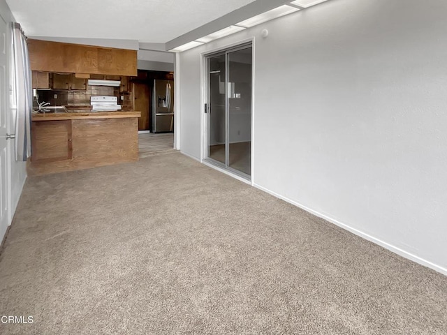 816 W Alene Ave, Ridgecrest, CA 93555 - unfurnished living room featuring light carpet