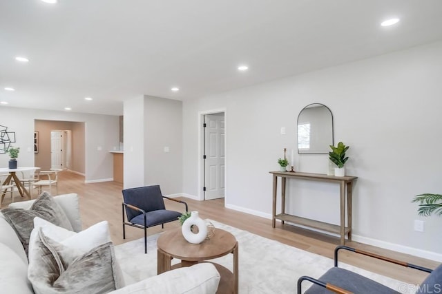 3629 Gilmore St, San Diego, CA 92113 - living area featuring light wood finished floors and recessed lighting