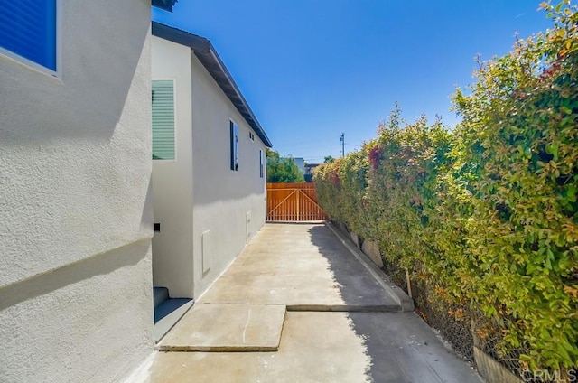 3629 Gilmore St, San Diego, CA 92113 - view of side of property featuring stucco siding