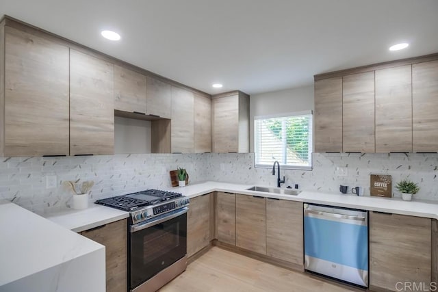 3629 Gilmore St, San Diego, CA 92113 - kitchen with appliances with stainless steel finishes, tasteful backsplash, light countertops, and recessed lighting