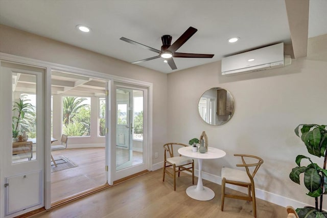 4107 Cole Way, San Diego, CA 92117 - living area featuring a wall unit AC, a ceiling fan, light wood-type flooring, and recessed lighting