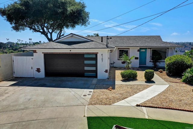 4107 Cole Way, San Diego, CA 92117 - ranch-style home featuring an attached garage, stucco siding, concrete driveway, and a shingled roof