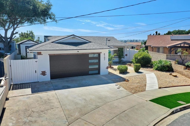 4107 Cole Way, San Diego, CA 92117 - ranch-style home with roof with shingles, concrete driveway, stucco siding, a gate, and an attached garage