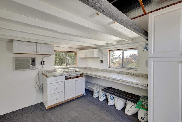 4107 Cole Way, San Diego, CA 92117 - kitchen with carpet, light countertops, white cabinetry, a wall mounted air conditioner, and beam ceiling