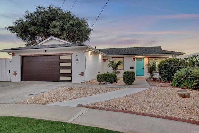 4107 Cole Way, San Diego, CA 92117 - ranch-style home with a garage, driveway, and stucco siding