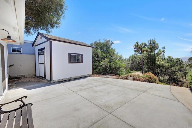 4107 Cole Way, San Diego, CA 92117 - view of patio with a shed