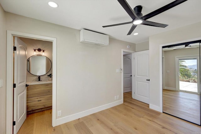 4107 Cole Way, San Diego, CA 92117 - unfurnished bedroom featuring a wall unit AC, light wood-style flooring, recessed lighting, ensuite bath, and a ceiling fan