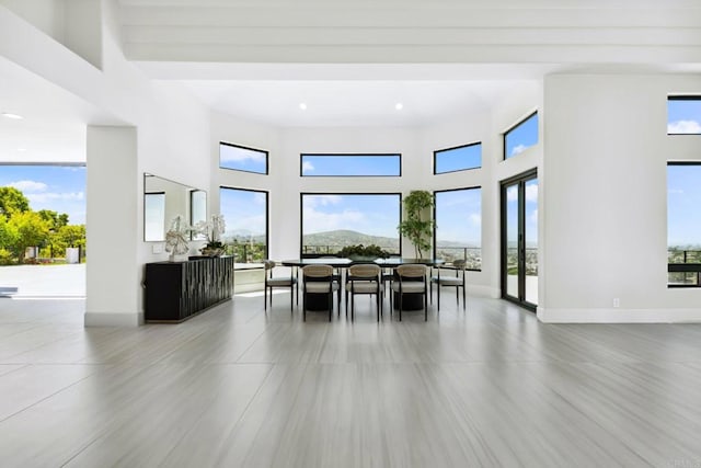 9355 Lavell St, La Mesa, CA 91941 - dining room featuring healthy amount of natural light, a towering ceiling, and recessed lighting