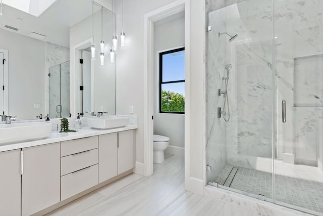 9355 Lavell St, La Mesa, CA 91941 - bathroom featuring a marble finish shower and double vanity