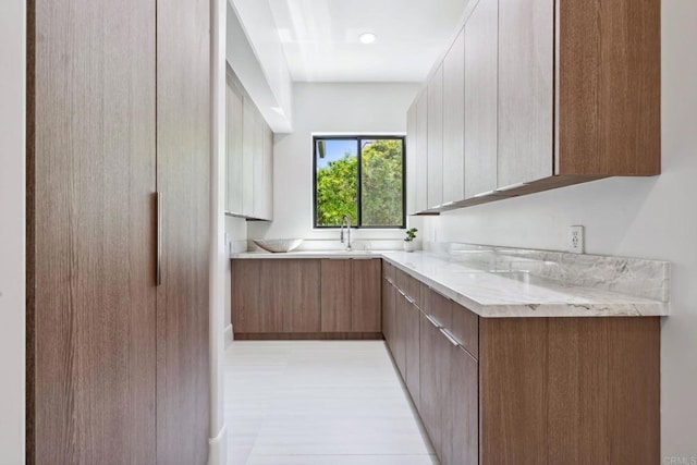 9355 Lavell St, La Mesa, CA 91941 - kitchen featuring modern cabinets, light countertops, and light wood finished floors