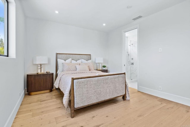 9355 Lavell St, La Mesa, CA 91941 - bedroom with wood finished floors, recessed lighting, and ensuite bath