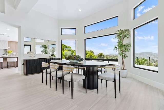 9355 Lavell St, La Mesa, CA 91941 - dining space with a high ceiling and recessed lighting