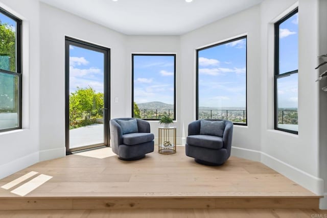 9355 Lavell St, La Mesa, CA 91941 - sitting room featuring wood finished floors, a mountain view, and recessed lighting