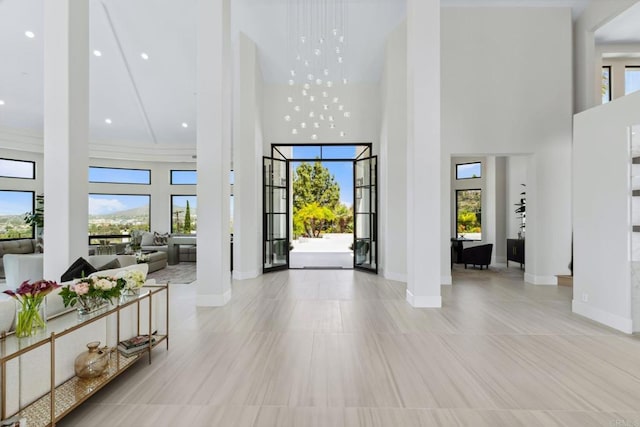 9355 Lavell St, La Mesa, CA 91941 - foyer featuring a high ceiling, tile patterned flooring, decorative columns, and recessed lighting