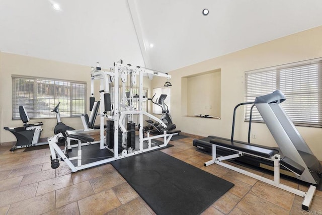 12032 Calle De Medio Unit 169, El Cajon, CA 92019 - gym featuring stone tile floors, high vaulted ceiling, and recessed lighting