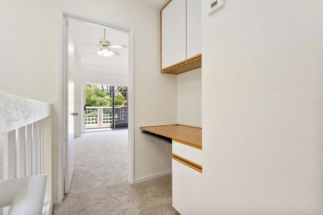 12032 Calle De Medio Unit 169, El Cajon, CA 92019 - corridor featuring light carpet and baseboards