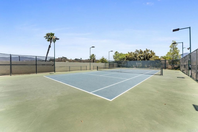 12032 Calle De Medio Unit 169, El Cajon, CA 92019 - view of tennis court featuring community basketball court