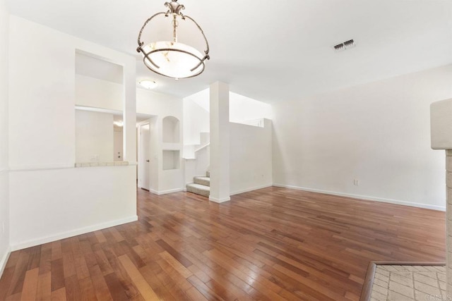 12032 Calle De Medio Unit 169, El Cajon, CA 92019 - empty room featuring hardwood / wood-style flooring and stairway