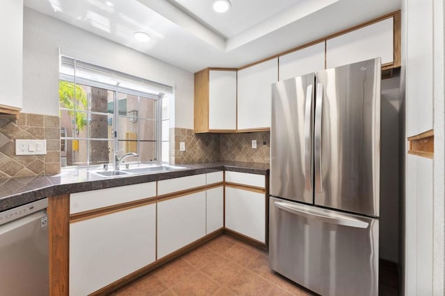 12032 Calle De Medio Unit 169, El Cajon, CA 92019 - kitchen featuring stainless steel appliances, white cabinets, backsplash, dark countertops, and recessed lighting