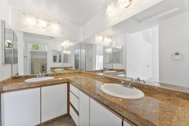 12032 Calle De Medio Unit 169, El Cajon, CA 92019 - bathroom with double vanity and a stall shower