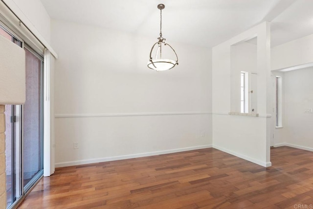 12032 Calle De Medio Unit 169, El Cajon, CA 92019 - unfurnished dining area featuring wood finished floors and baseboards