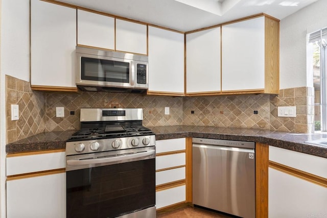 12032 Calle De Medio Unit 169, El Cajon, CA 92019 - kitchen featuring appliances with stainless steel finishes, tile counters, and white cabinetry