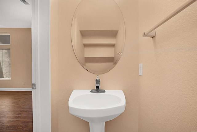 12672 Carmel Country Rd Unit 51, San Diego, CA 92130 - bathroom with wood-type flooring and baseboards