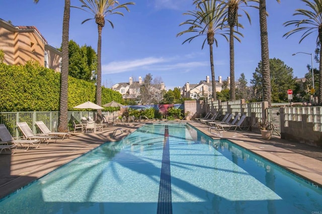 12672 Carmel Country Rd Unit 51, San Diego, CA 92130 - community pool featuring a residential view and a patio