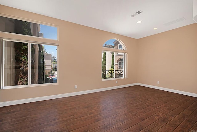 12672 Carmel Country Rd Unit 51, San Diego, CA 92130 - unfurnished room featuring dark wood finished floors and recessed lighting